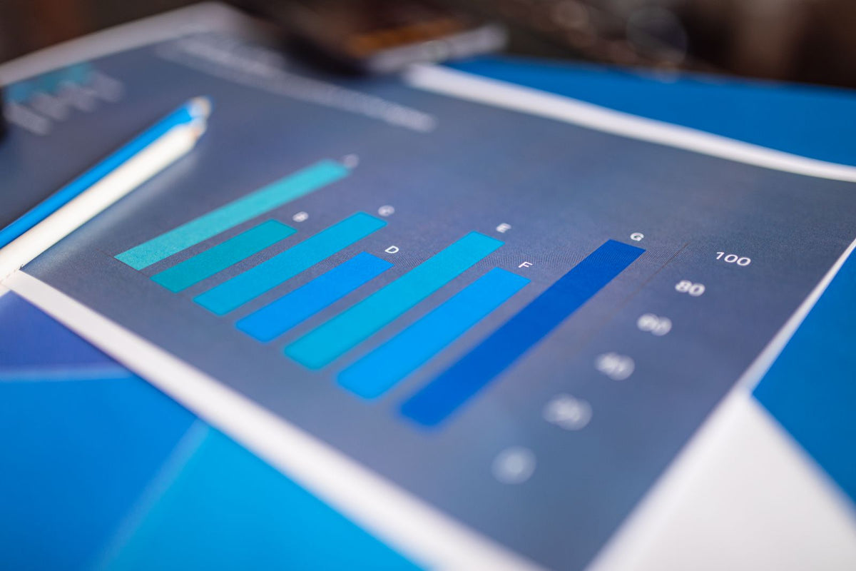 Close-up of a blue bar graph printed on paper for data analysis