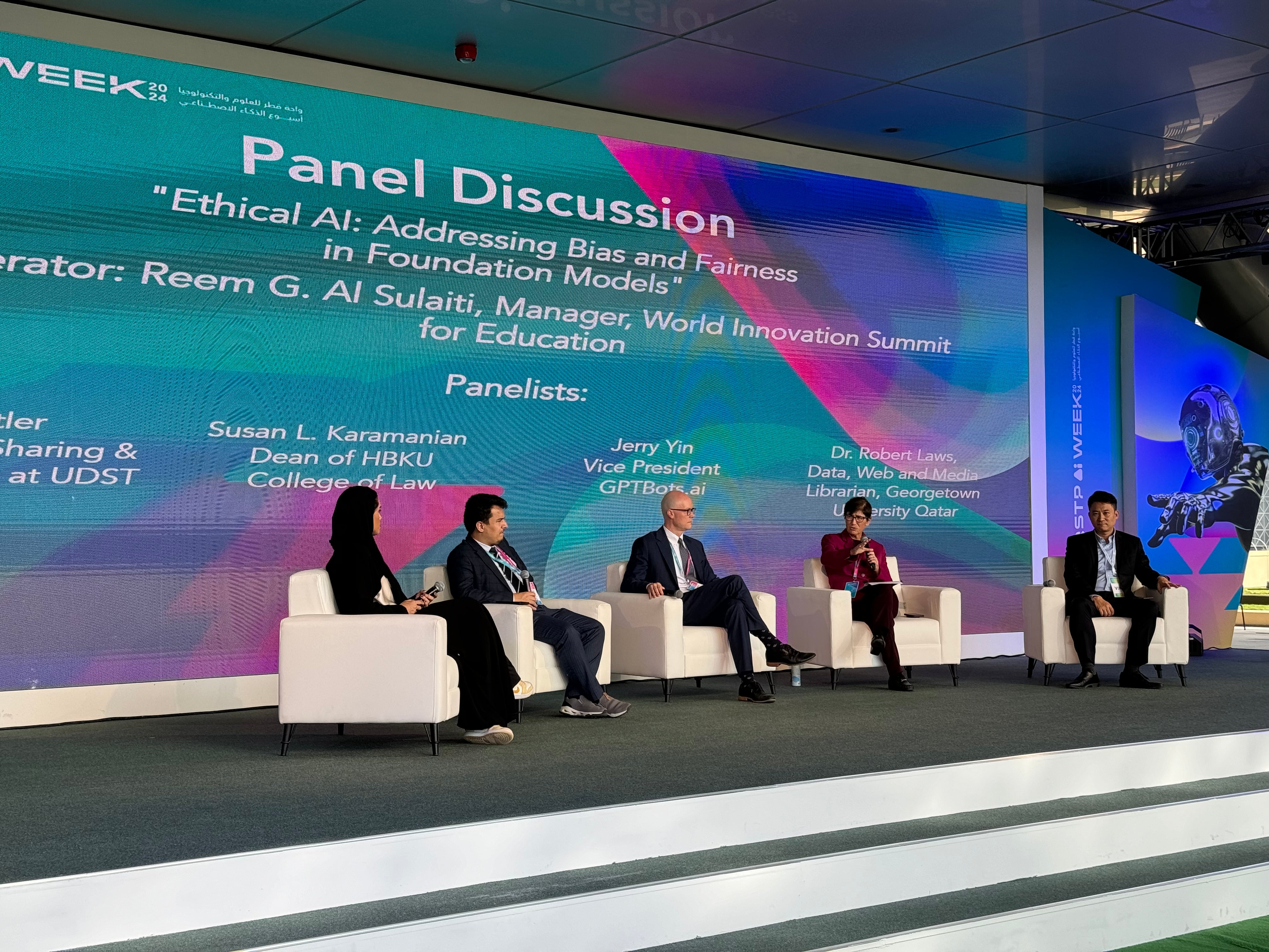 Falak panel discussion and presentation at Day 2 event, featuring speakers engaged in a professional discussion.