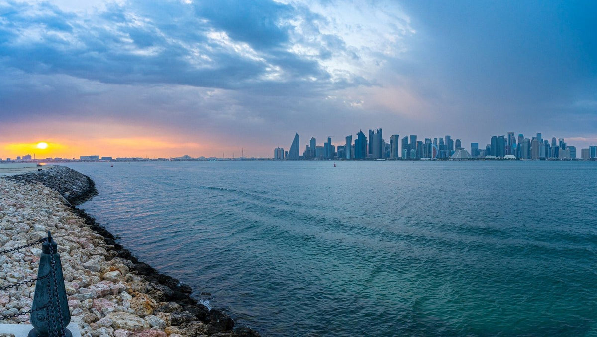Doha skyline at sunset seen from the waterfront