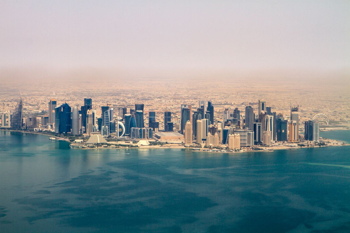 Aerial view of the Doha skyline and West Bay towers on a clear day